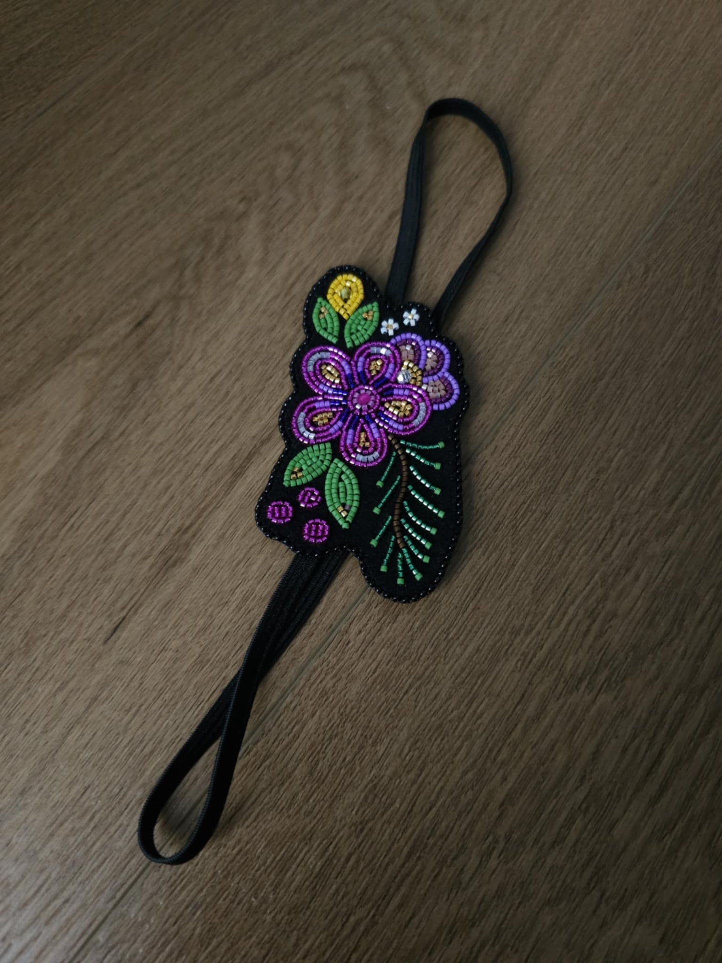 Beaded pink flower with branch